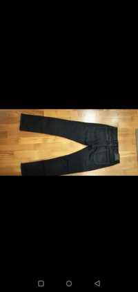 Męskie czarne elastyczne jeansy the slim c&a 32/34