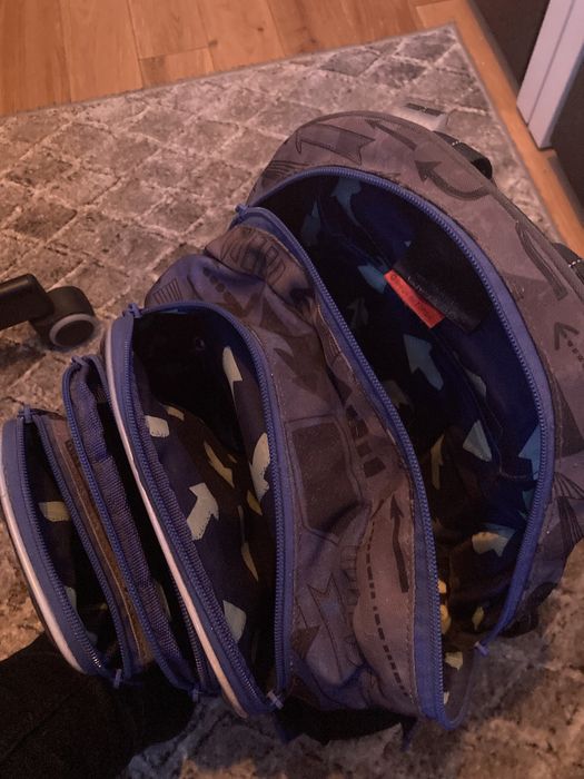 Plecak szkolny Topgal niebieski w strzałki, pojemny 4 komory