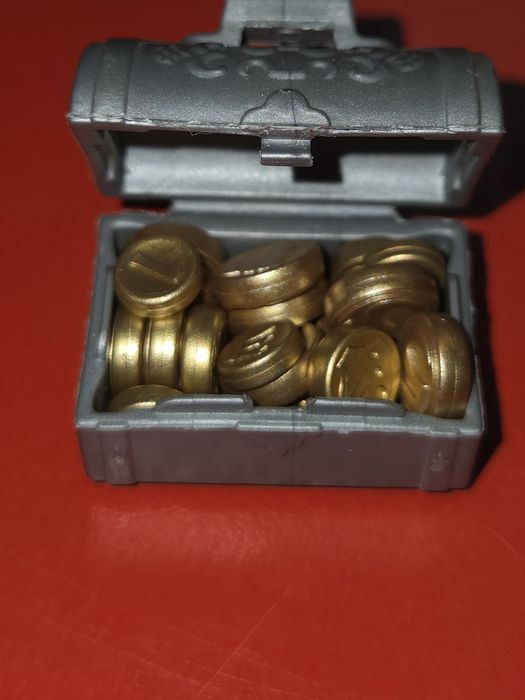 Pirata Playmobil com baú de moedas