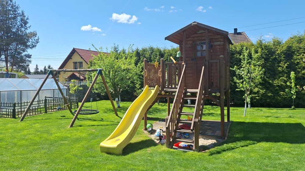 Plac zabaw huśtawka zjeżdżalnia wspinaczka domek dla dzieci bocianie