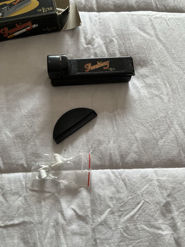 Máquina para enrolar cigarros