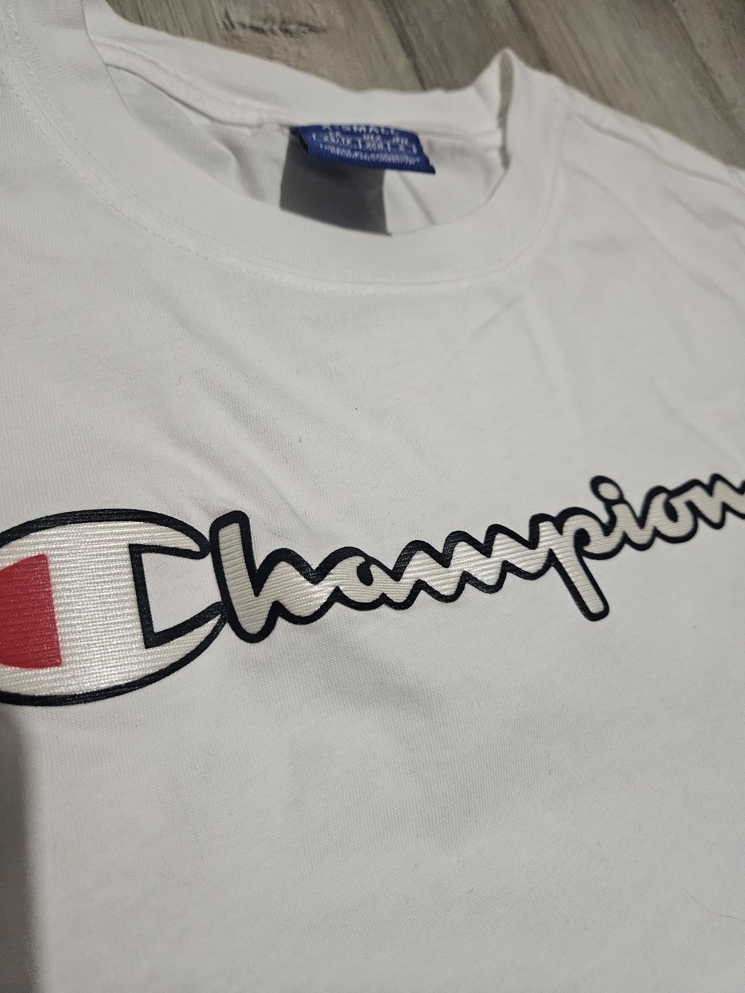 Damski t-shirt Champion.  Rozmiar XS. Stan idealny