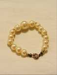 Pulseira de Ouro com Pérolas