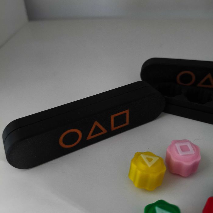Jogo de dados Gonggi com chumbo da serie Squid Game.