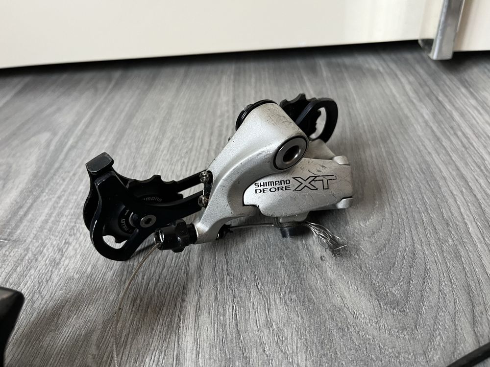Перекидки і перемикачі Shimano Deore