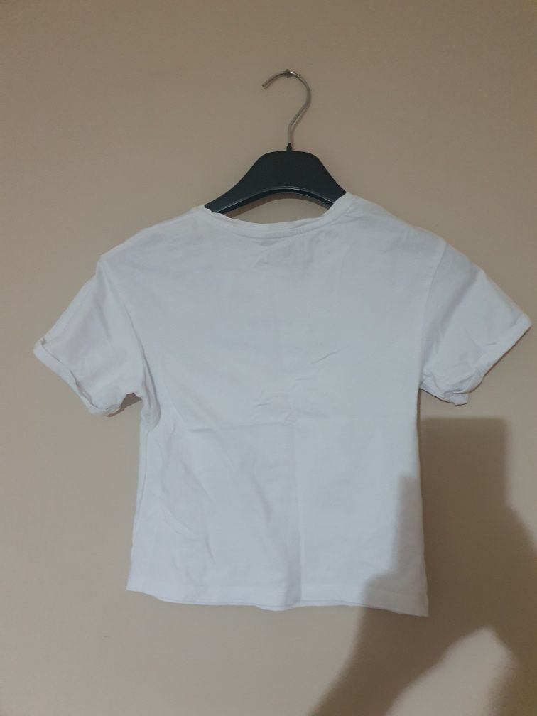 Biała bluzka z krótkim rękawem 140 cm primark
