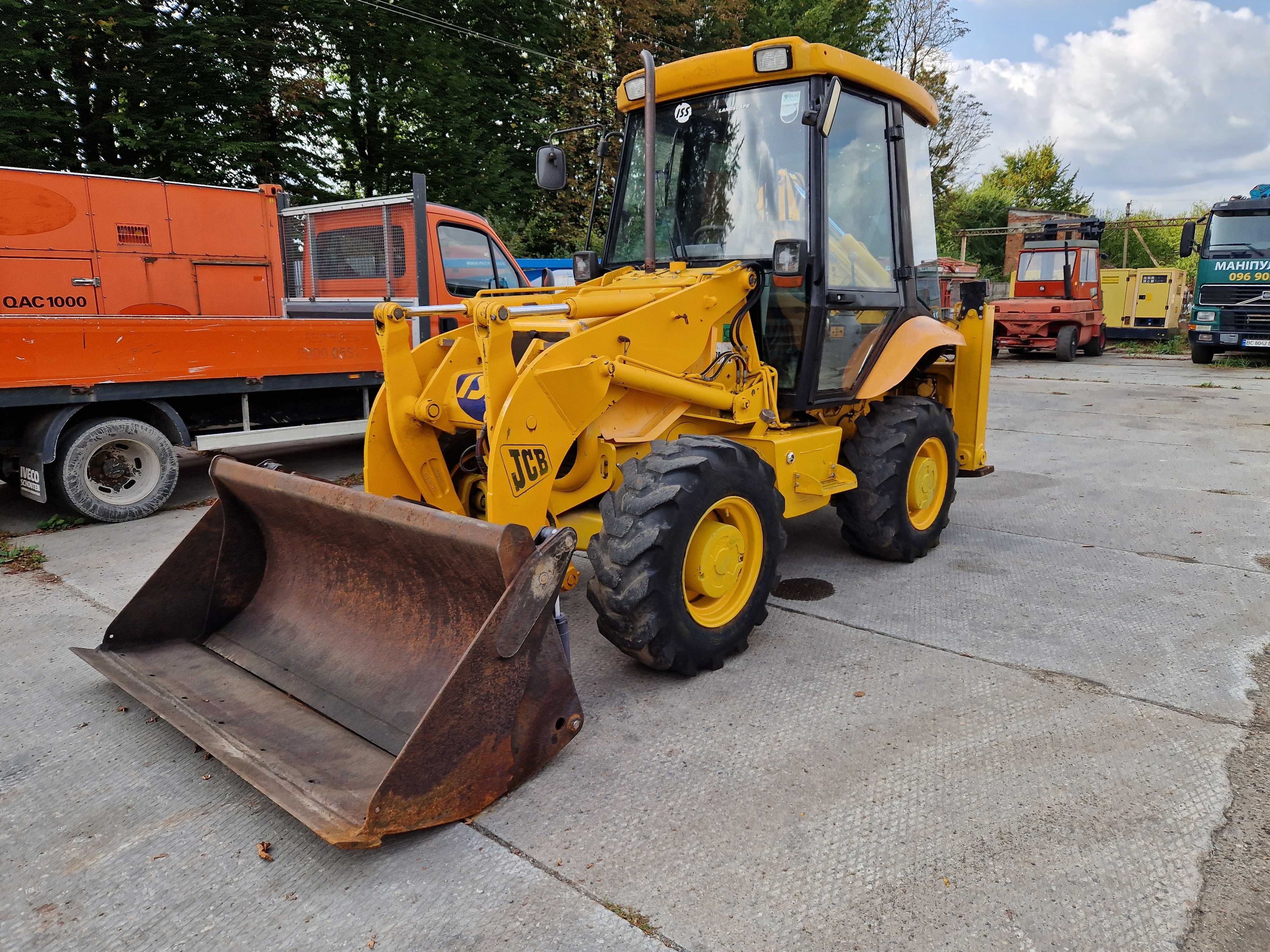 Екскаватор навантажувач JCB 2CX, мінік