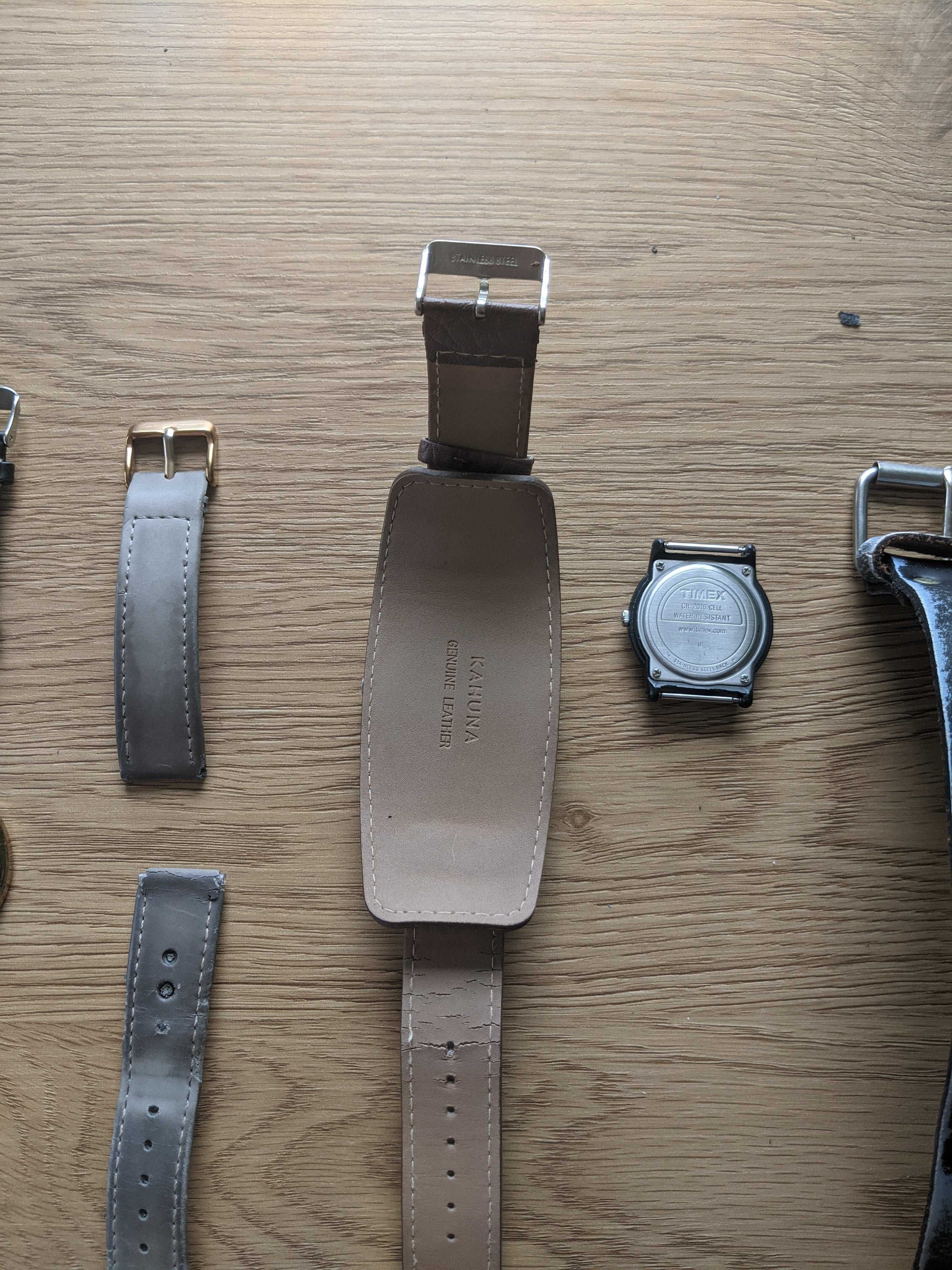 trzy zegarki na rękę, timex oraz inne