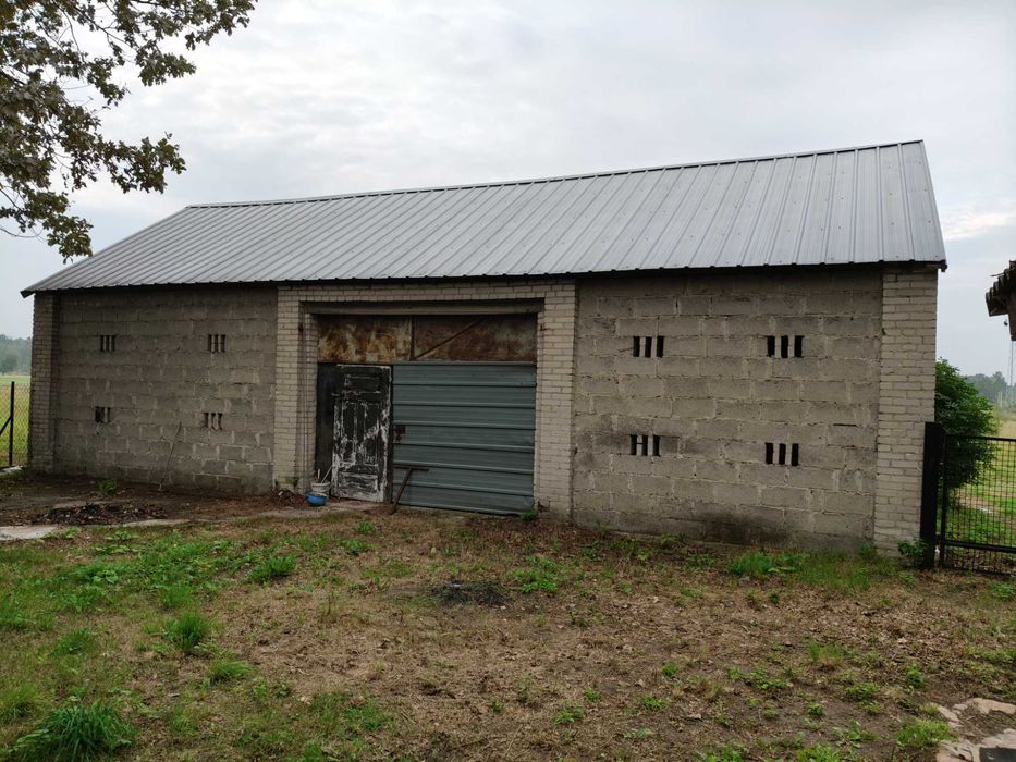 Siedlisko 1700m2 z domem i budynkami gospodarczymi + ziemia rolna.
