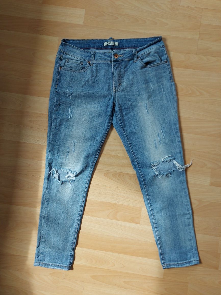 Damskie jeansy z dziurami/rozdarciami rozm. 42