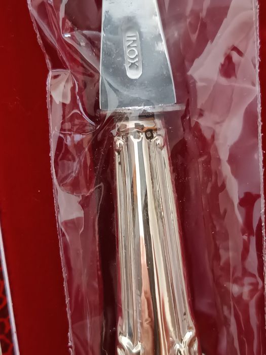 Talheres de prata e argola de guardanapo