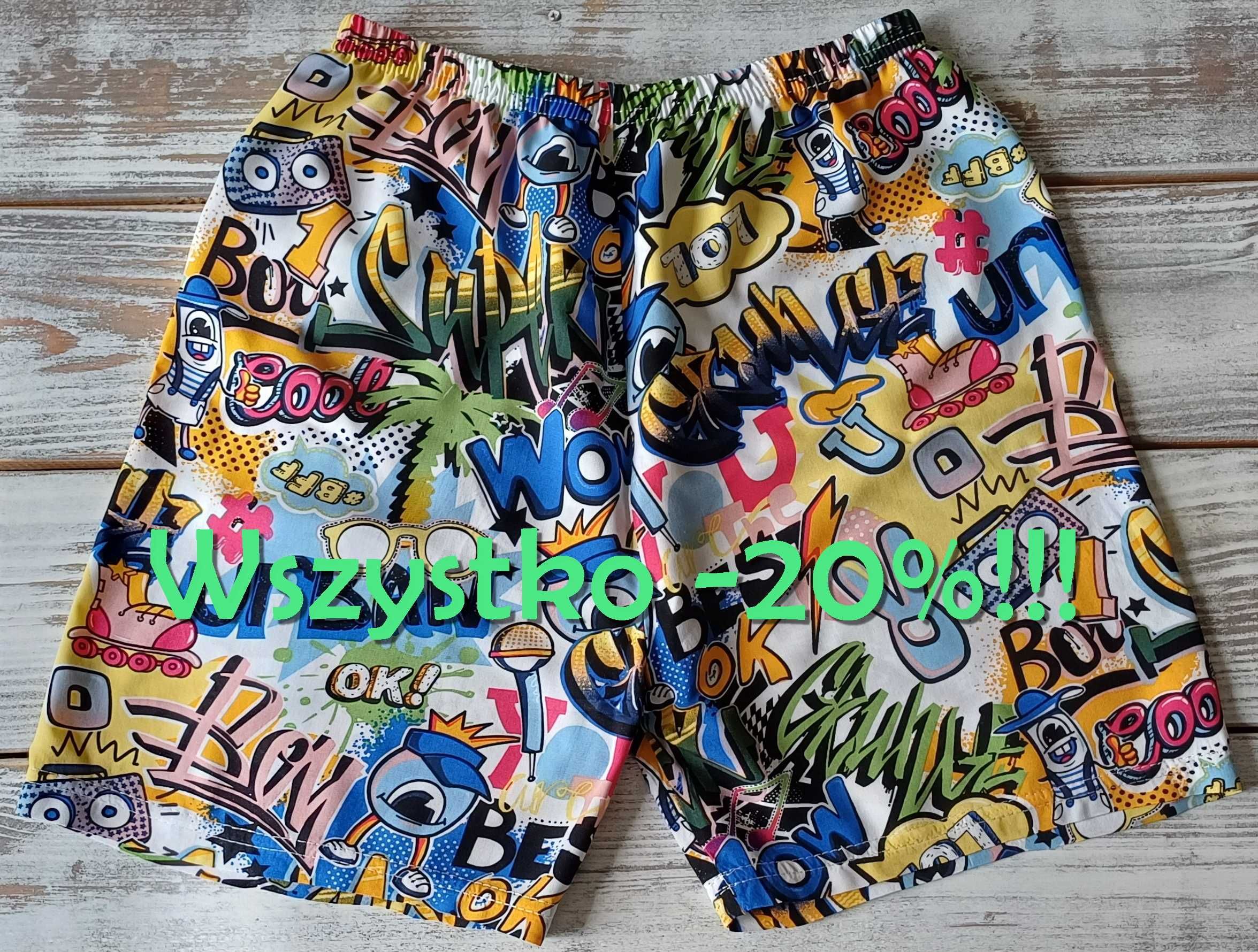 Nowe chłopięce spodenki letnie/ kąpielowe 140/146 w komiksy, graffiti