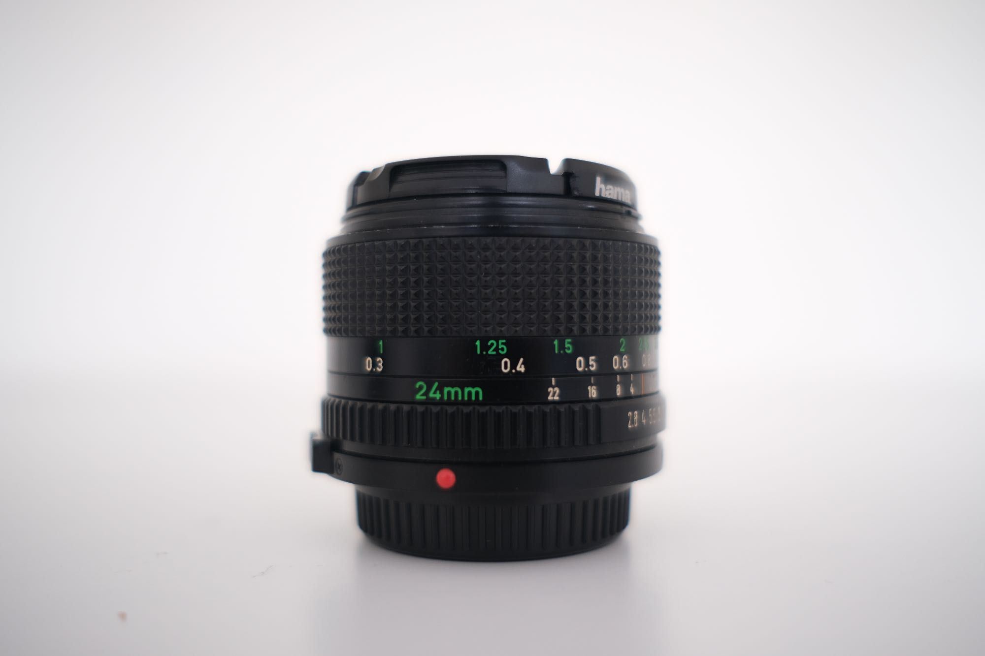 Canon AE-1 + Objetiva 50mm f/1.8 + Objetiva 24mm f/2.8