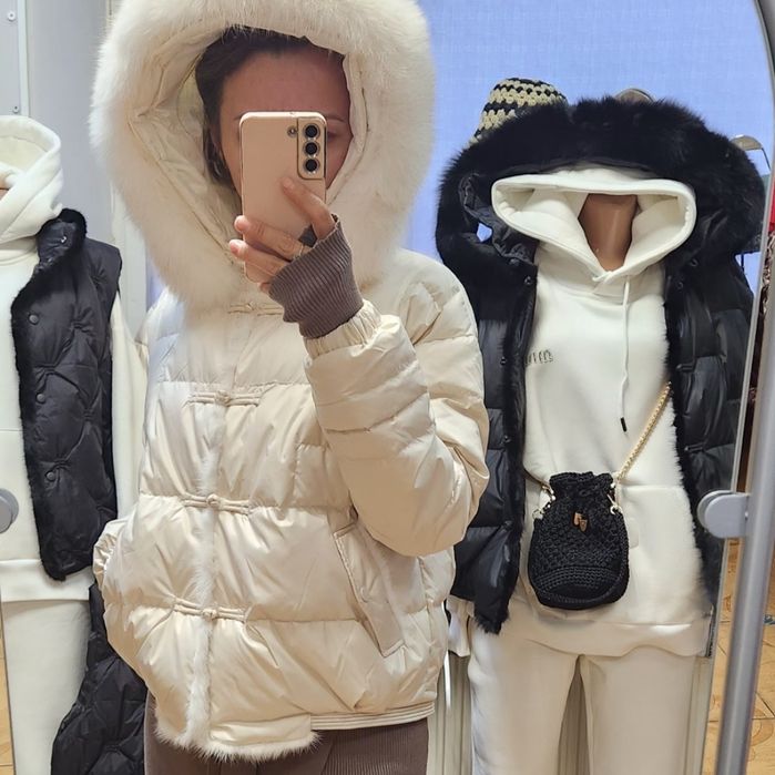 Зимова пухова куртка з капішоном