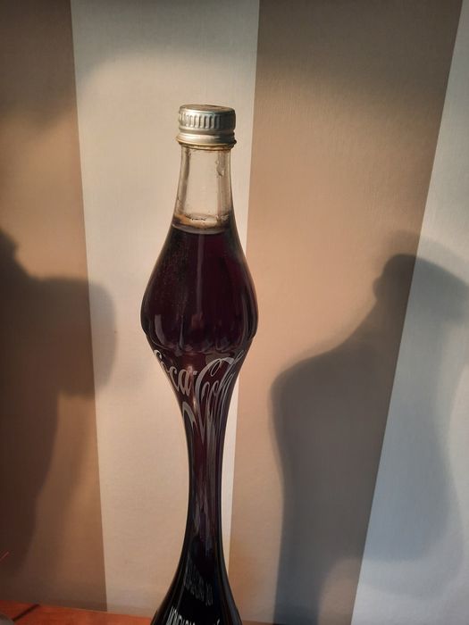 Coca-Cola  de litro, estilizada, 45 anos