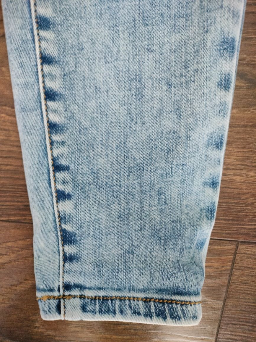 Damskie spodnie jeans 38
