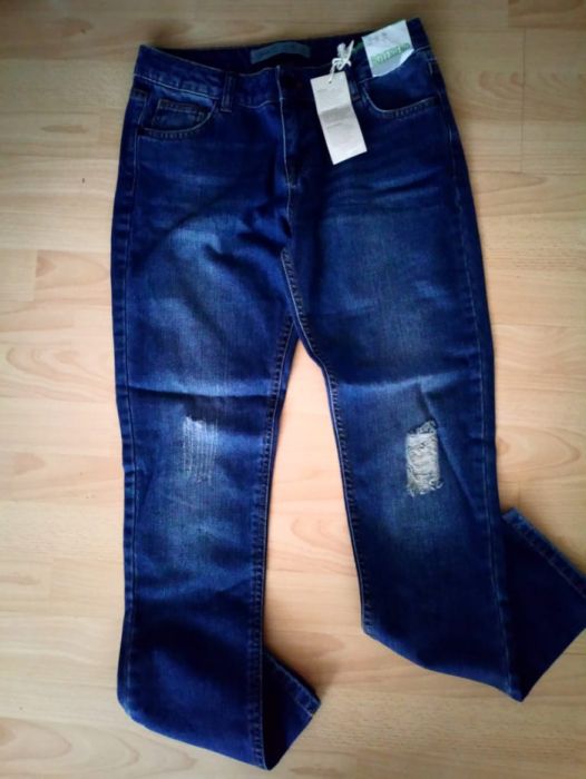 Nowe jeansy Denim 38 przetarcia oryginalne