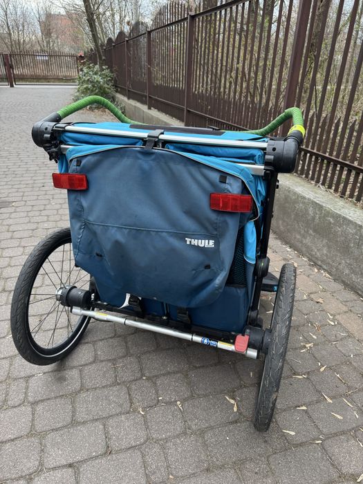 Przyczepa rowerowa thule cross 2 z zestawem biegowym oraz 1 śpiworem
