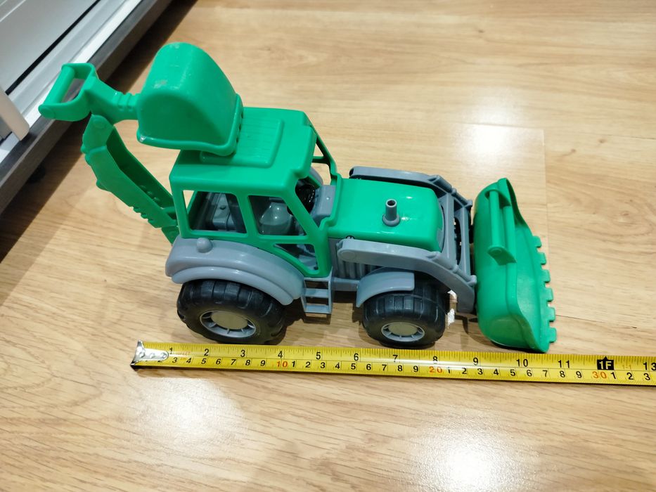 Машини будівельні, трактори великі з рухомими частинами