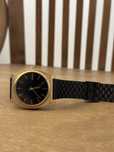 Relógio Nixon Preto e Dourado