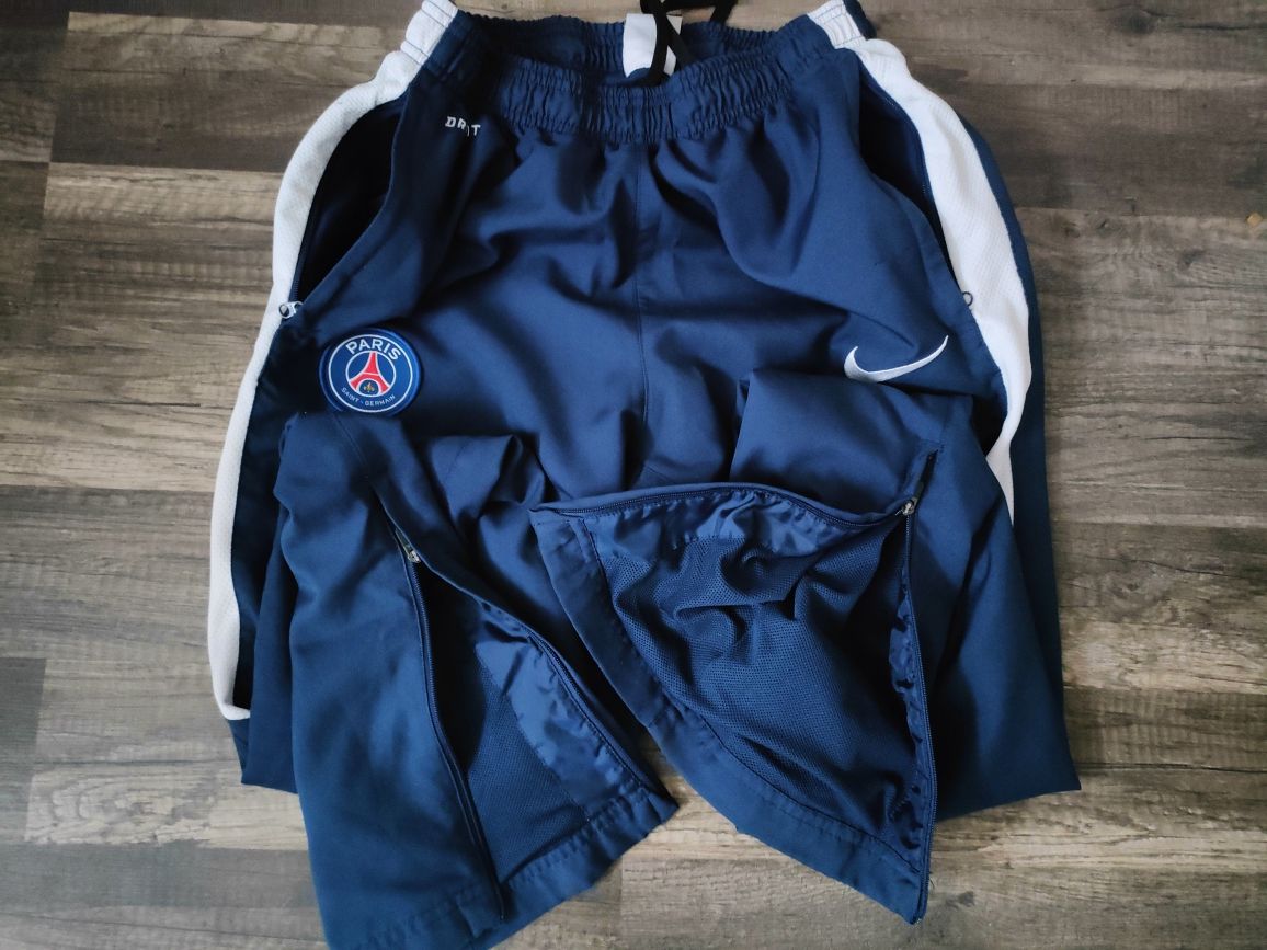 dresowe spodnie Nike dri-fit Paris Saint Germain z zamkami  i podszewk