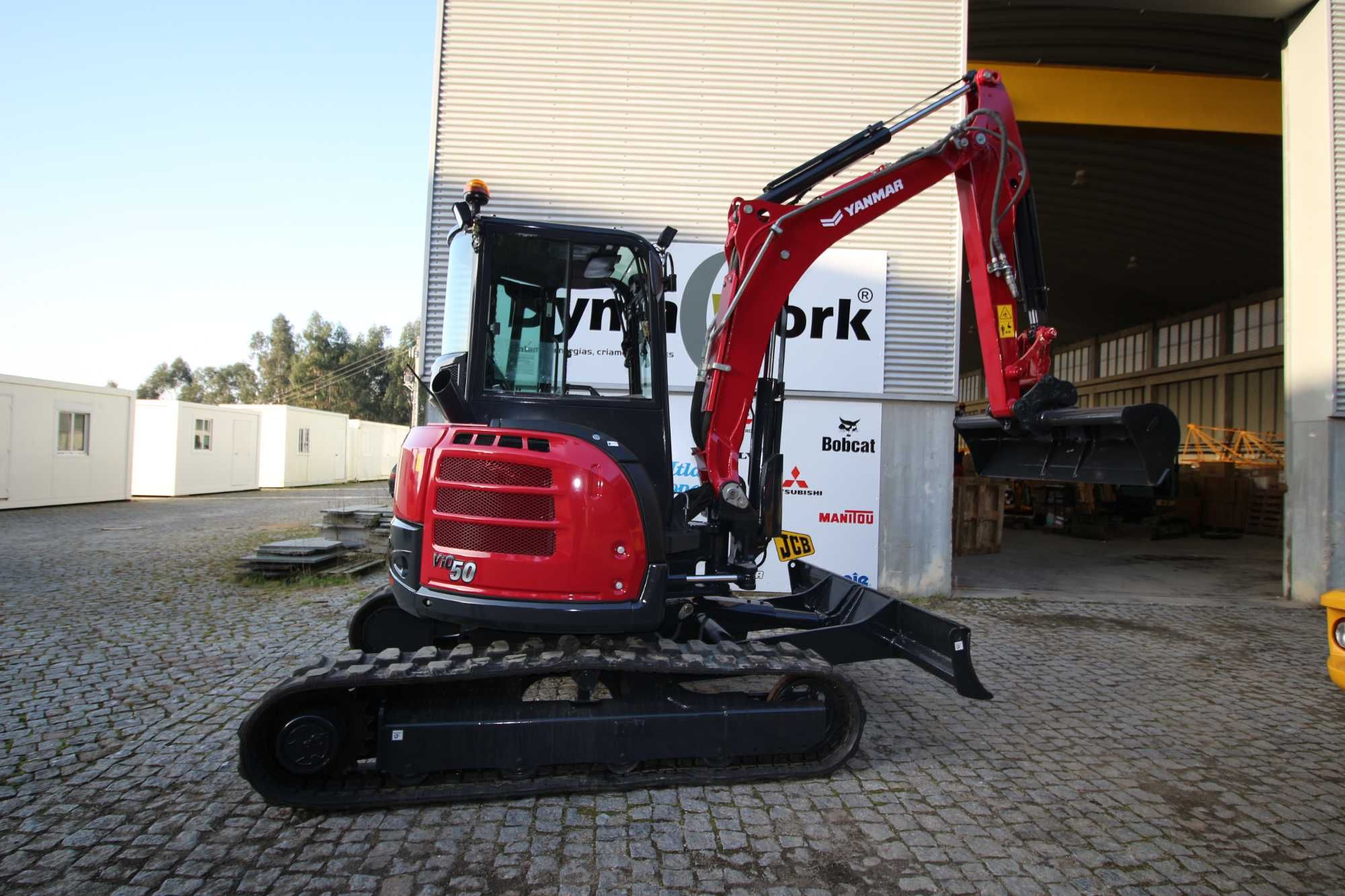 Minigiratória Máquina  rastos Yanmar VIO 50   (como nova )