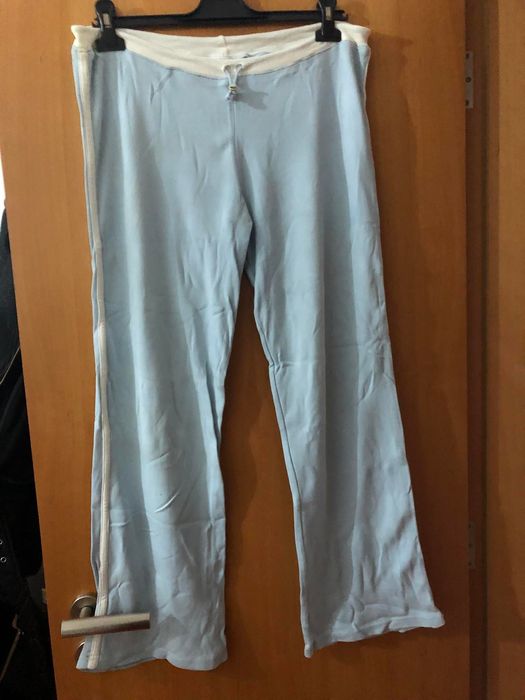 Calças azuis de fato de treino