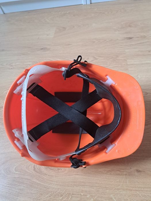 Kask budowlany pomarańczowy z uchwytem regulowany