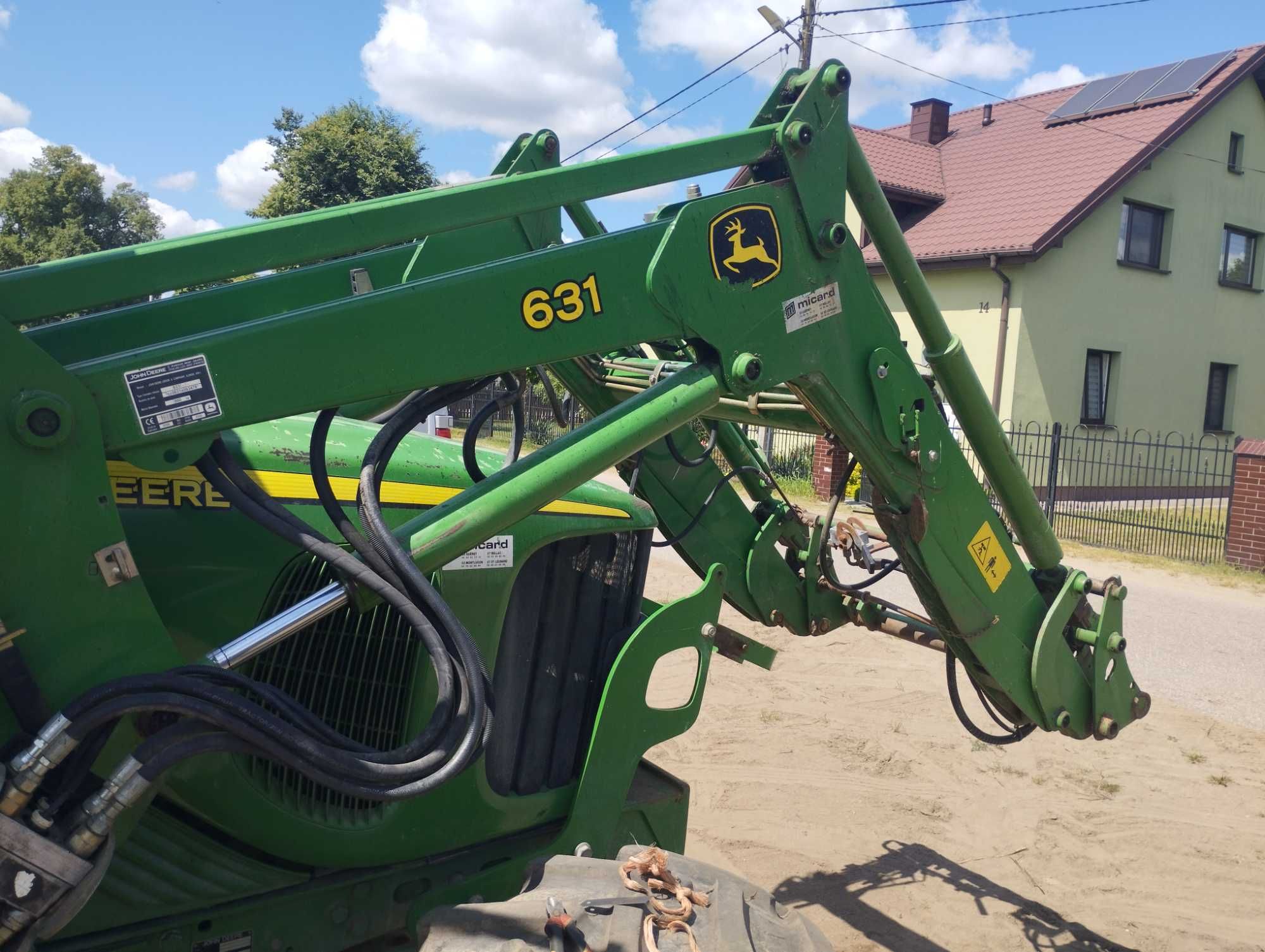 Ładowacz czołowy John Deere 631 , tur