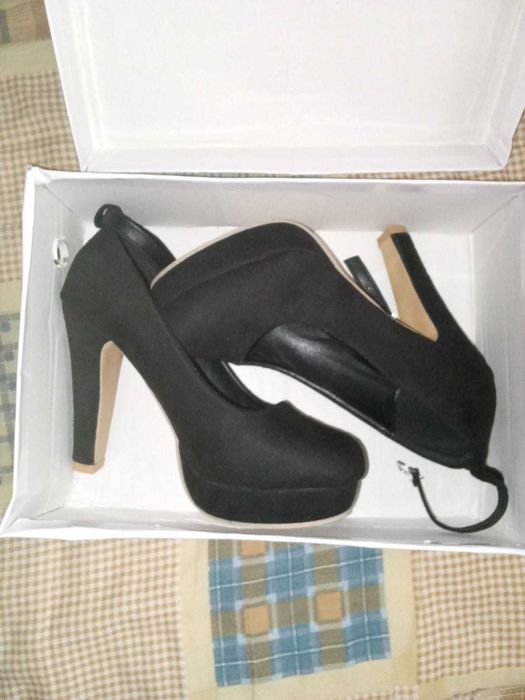 Sapatos de salto alto