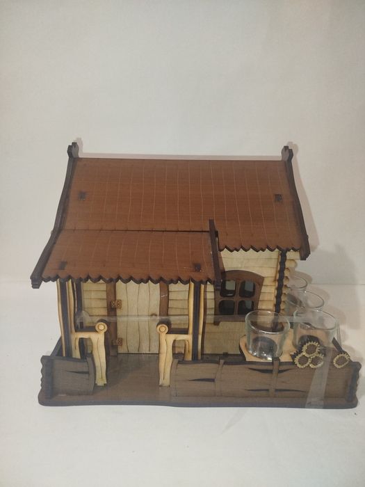 Декоративний будиночок з стопками