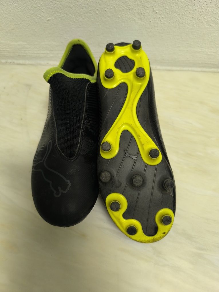 Chuteiras puma pretas