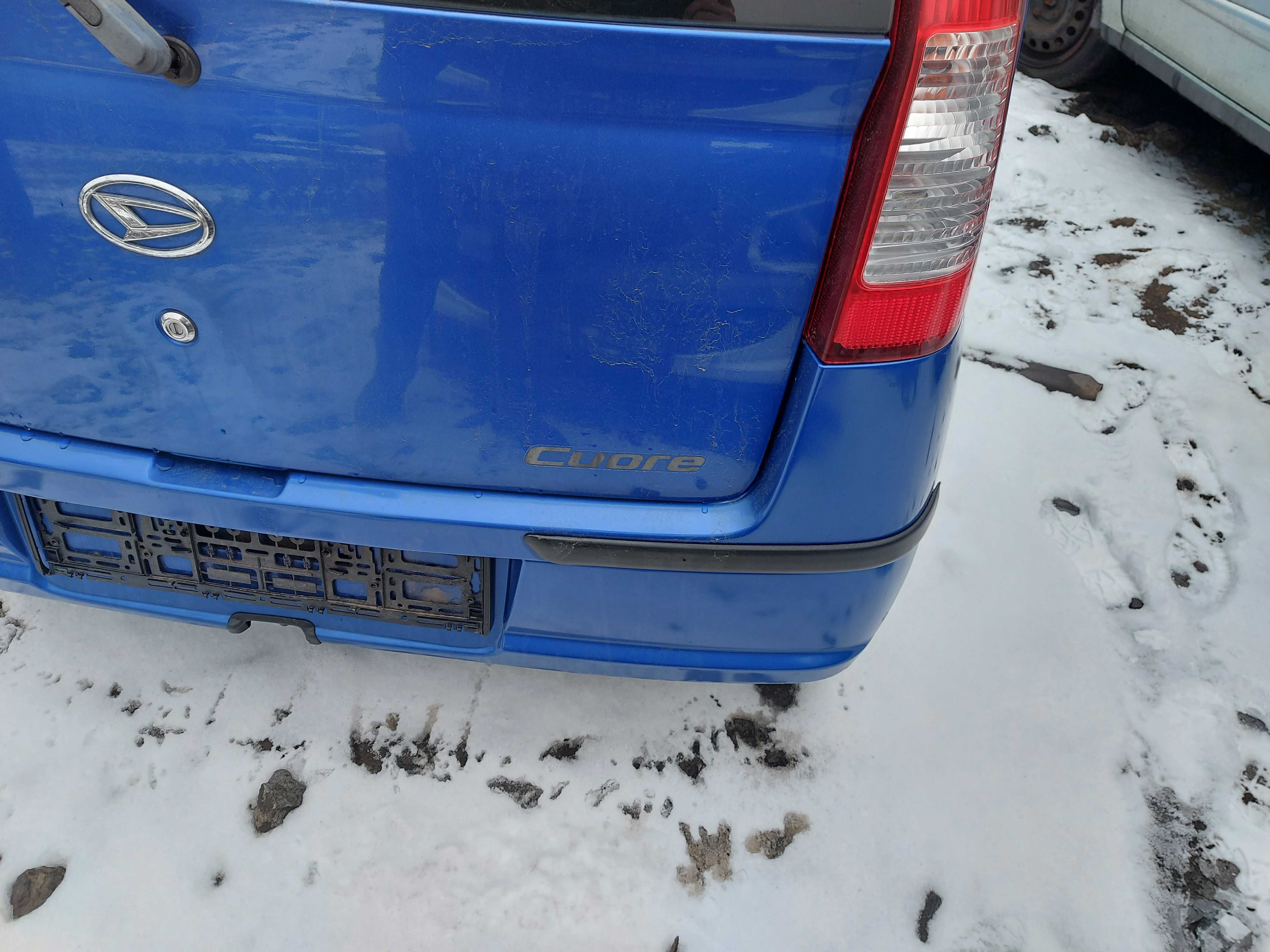 Daihatsu Cuore VI zderzak tylny FV transport/dostawa