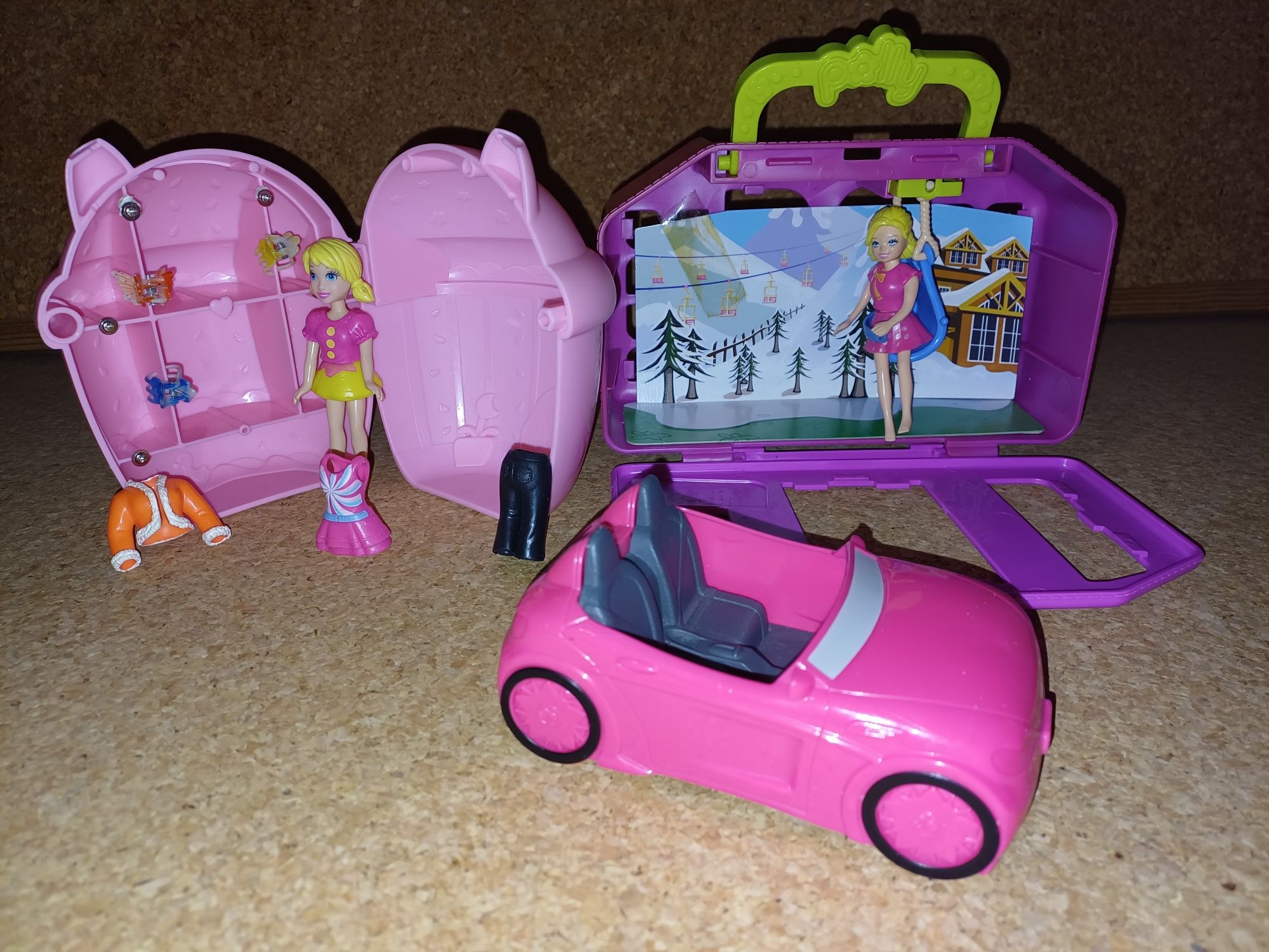 Polly pocket + 2 bonecas + carro + mala + acessórios.