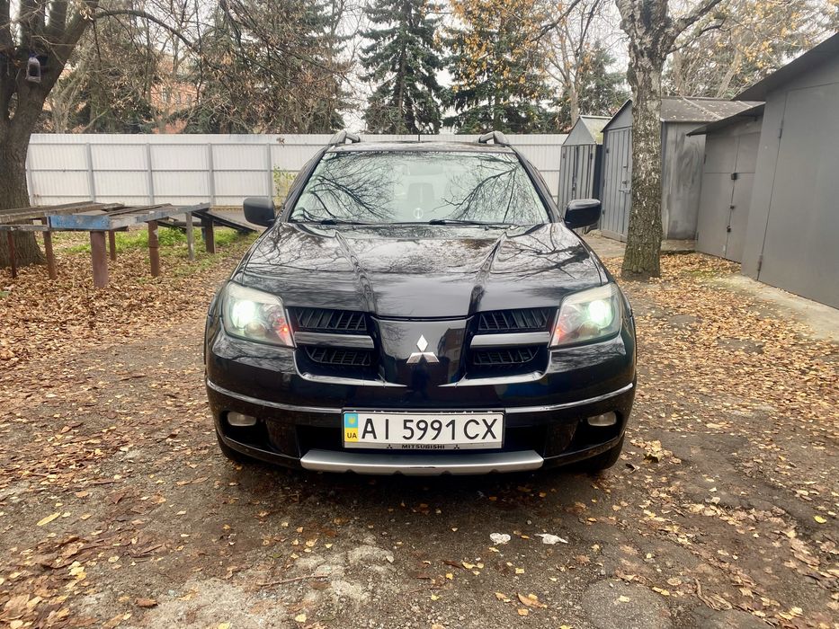 митсубиси Аутлендер 2.4 газ бензин автомат