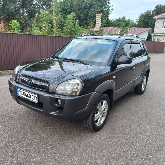 Hyundai Tucson, I покоління  2.0 DOHC МТ (142 к.с.) 4WD  Base