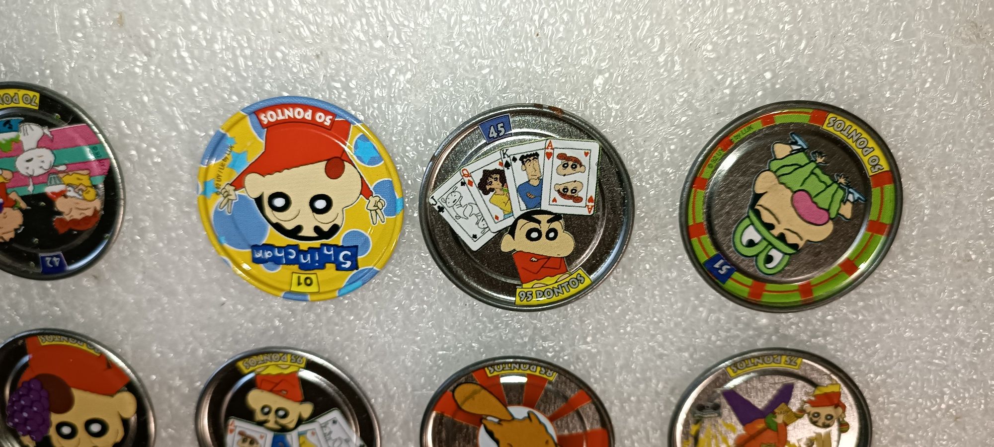 8 tazos coleção Shinchan Bollycao