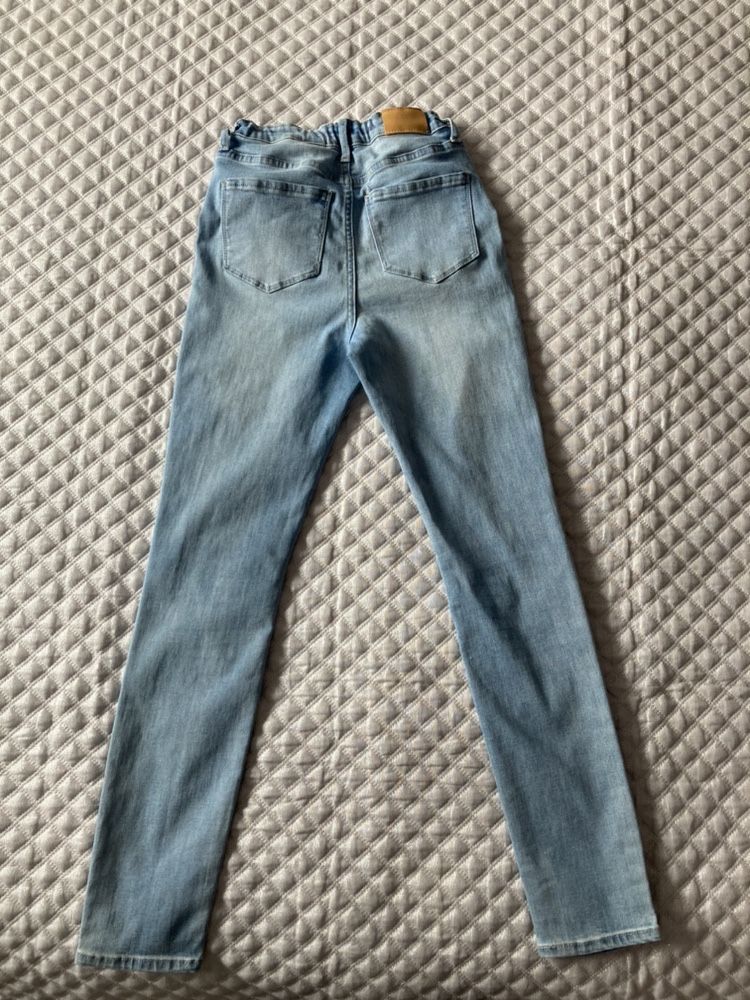 Dziewczęce jeansy spodnie rurki H&M w rozmiarze 146/152