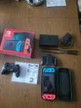 Konsola nintendo switch z dodatkami.