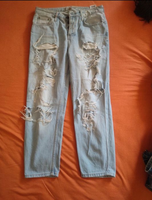 Spodnie z wysokim stanem szerokie dziurami bawełna  r 26/28 cienki dzi