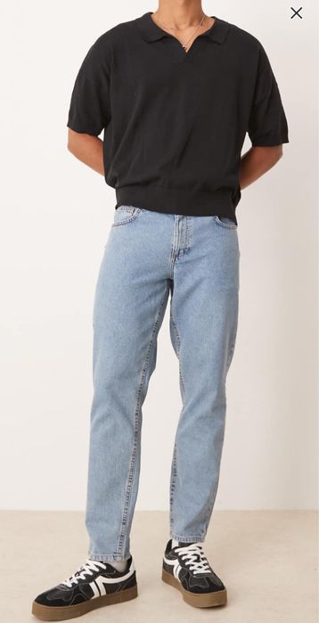 ASOS DESIGN tapered fit jeans in light wash blue