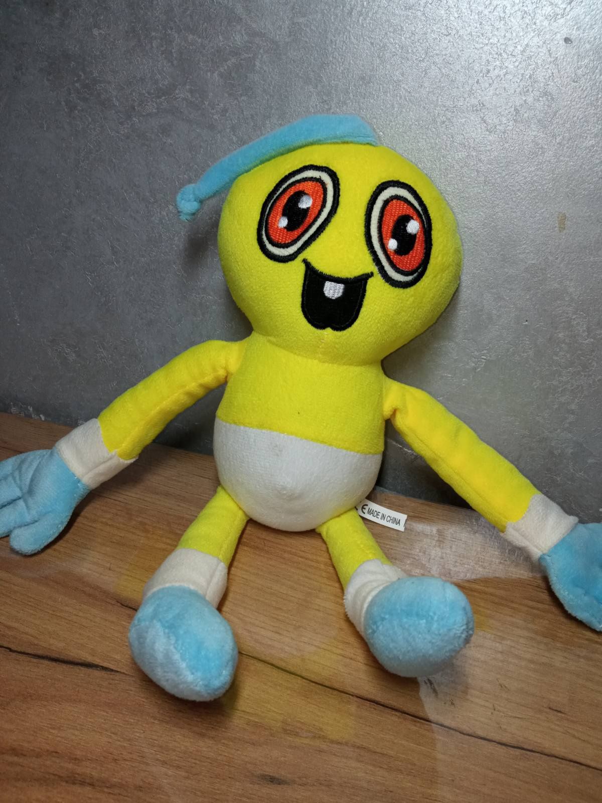 Іграшка Дитина в жовтому