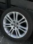Felgi aluminiowe Opel 18” z oponami letnimi – komplet 4 sztuki