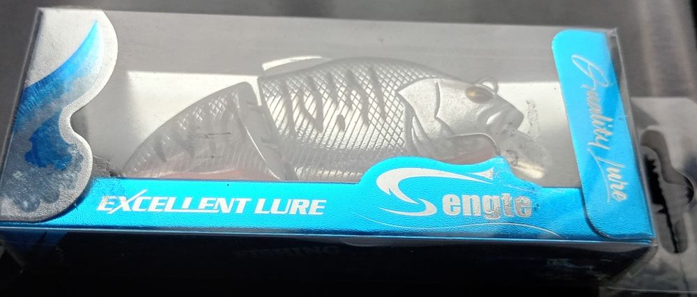 Wobler łamany Srebrna łuska grzechotka spinning oryg. pudełko