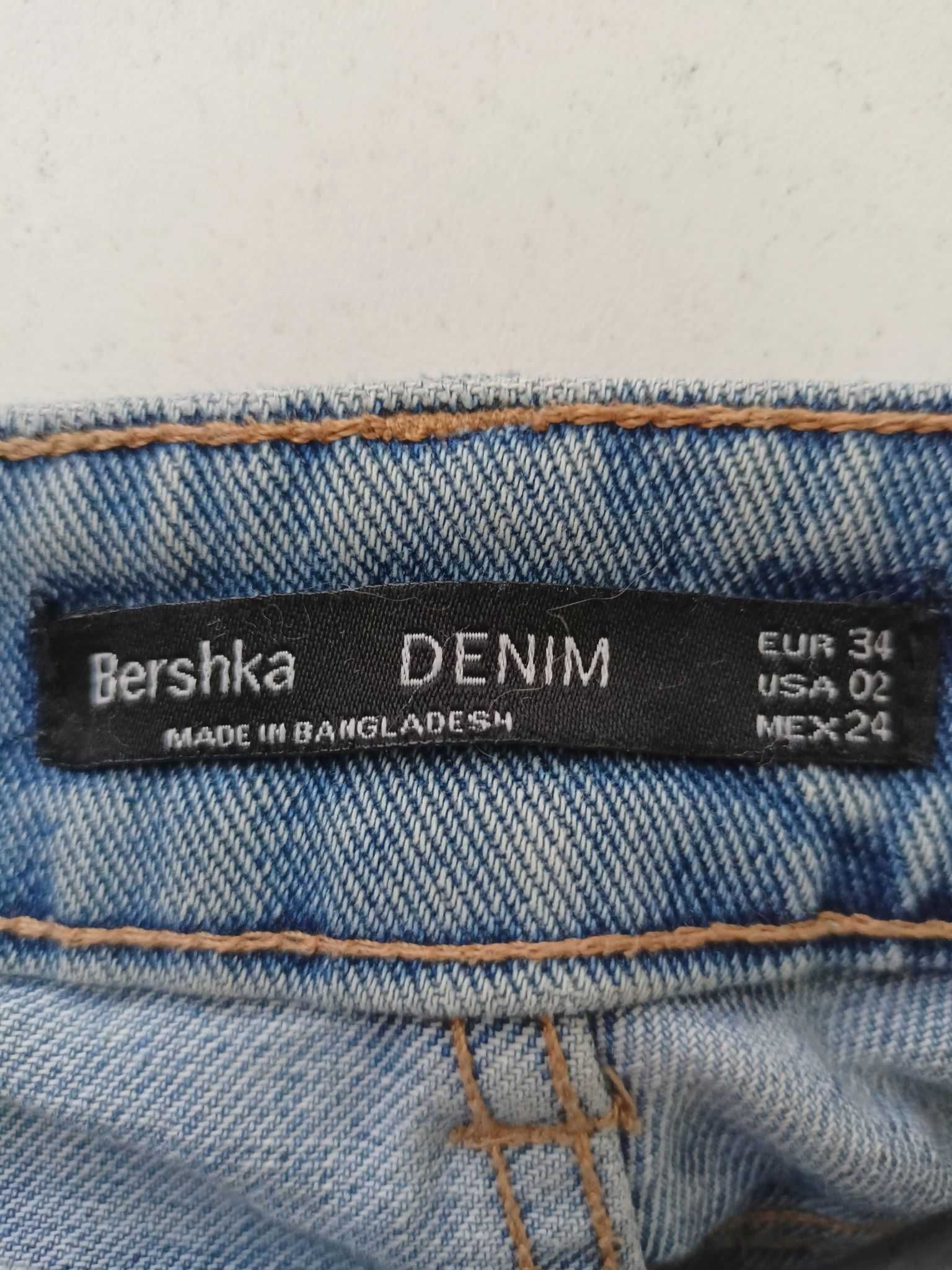 Spodnie Bershka z dziurami r.34