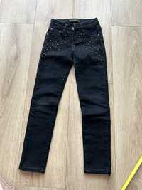 Czarne spodnie ćwieki jeansy rozmiar 134 nowe bez metki