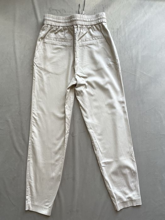 Spodnie klasyczne beżowe chinosy proste z wysokim stanem