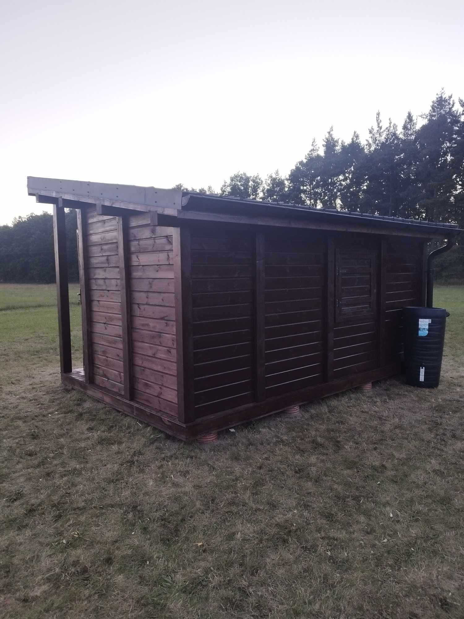 Drewniane konstrukcje zabudowy ogrodowe domki zadaszenia pergole płot