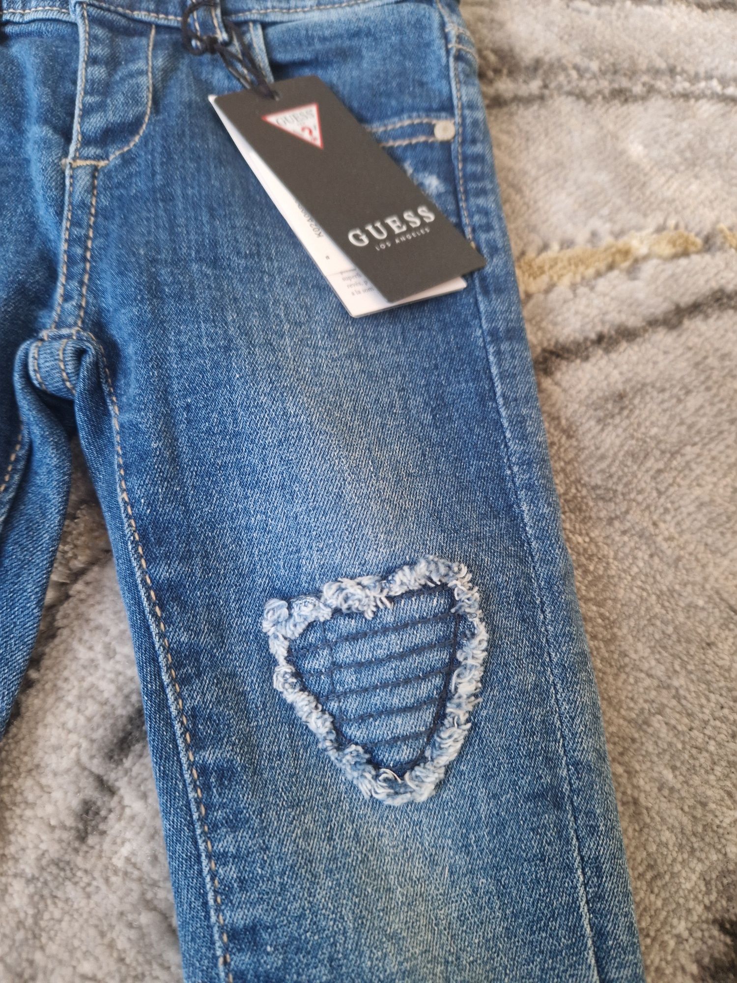 Spodnie jeansy dla dziewczynki Guess size 2