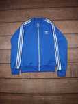 AdidasNiebieska bluza rozpinana bez kaptura z białymi paskami crewneck